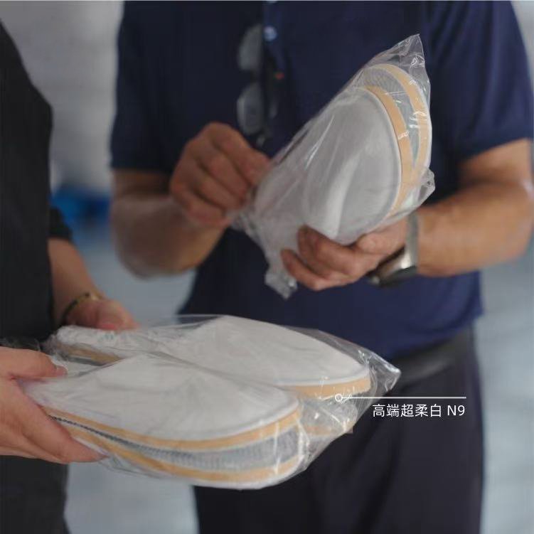 workers looking the white slippers careful 