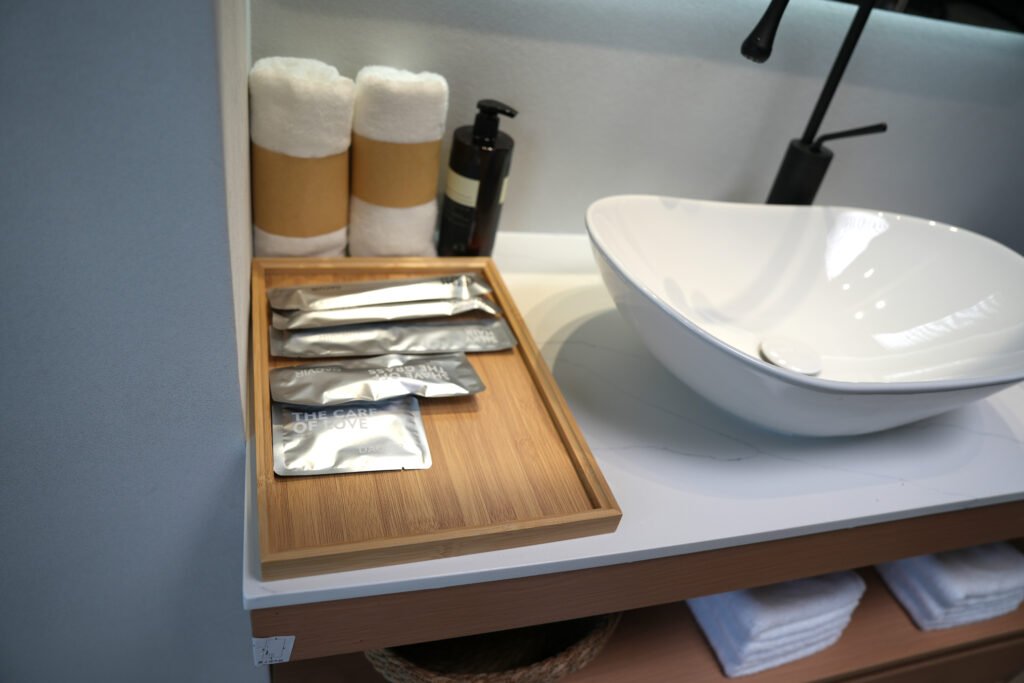 hotel linen,toothbrush,comb,shower cap,towel and etc.